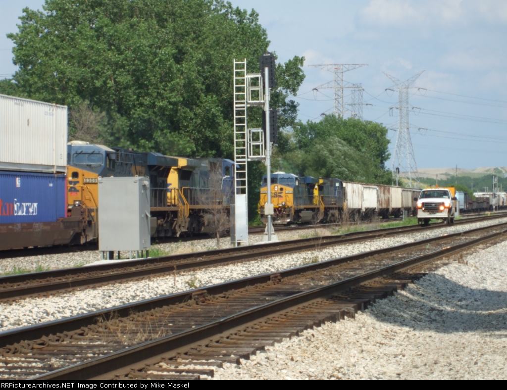 CSX 9030 two csx trains pass at dolton